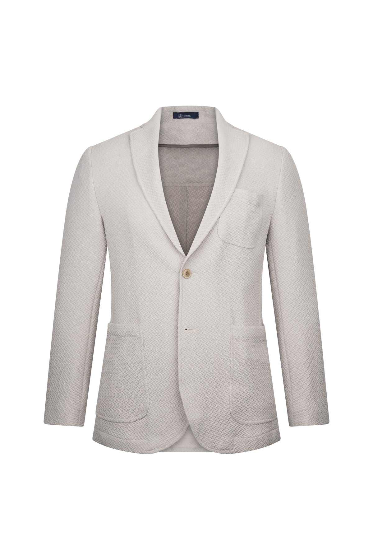 A light beige textured blazer with a single button closure and two front pockets.