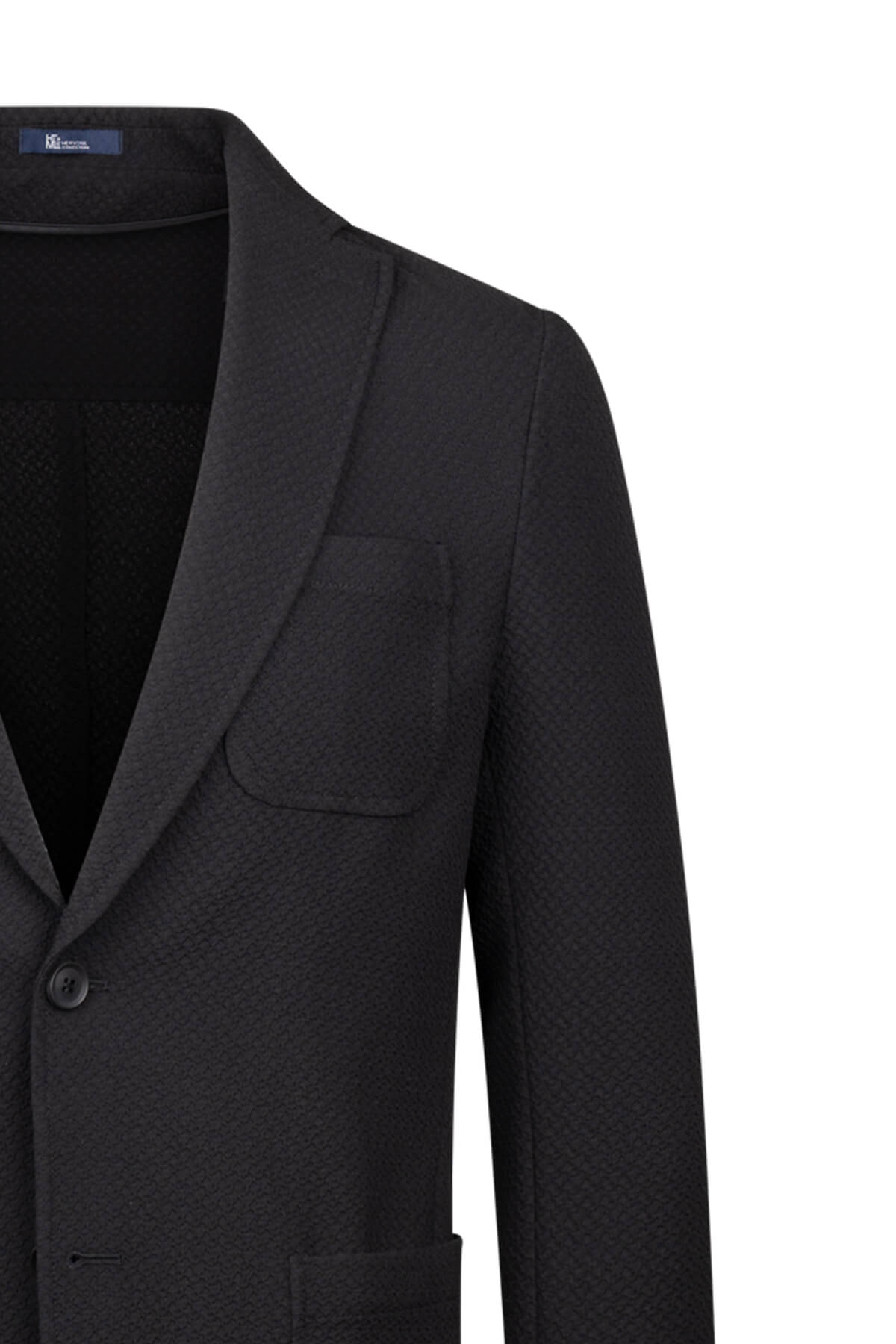 Black tailored blazer with a subtle textured weave and classic notched lapel.