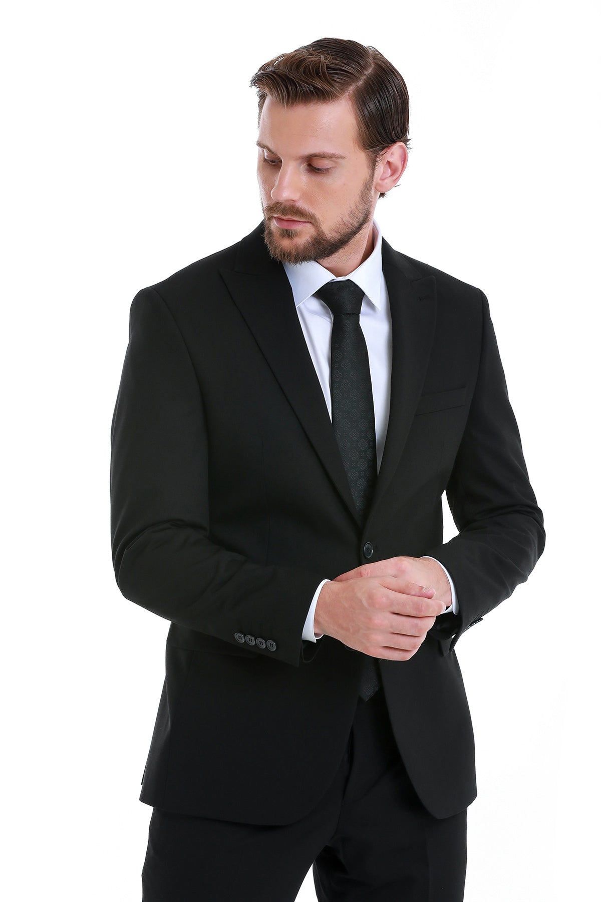 Slim fit black tailored suit jacket with peak lapel notched collar and three-button closure for formal wear