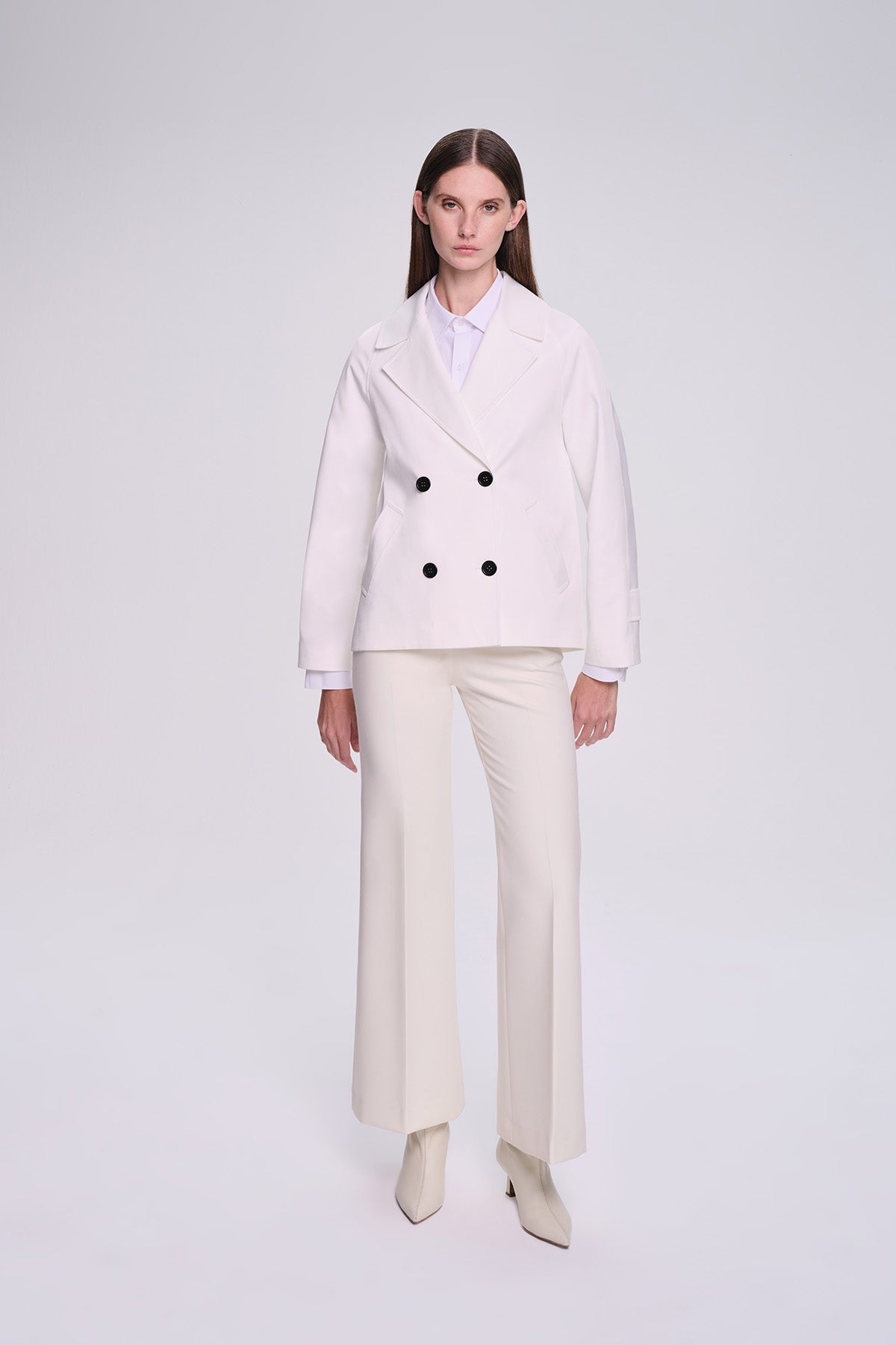 White double-breasted blazer with black buttons