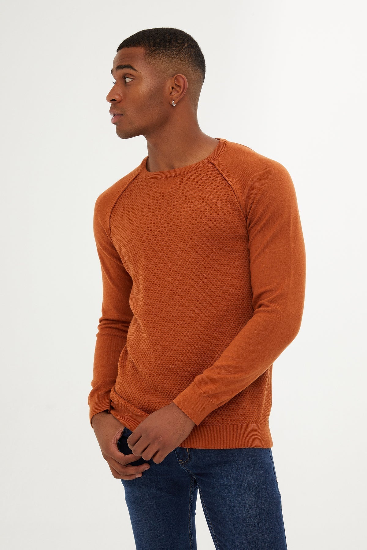 Orange textured knit sweater with raglan sleeves
