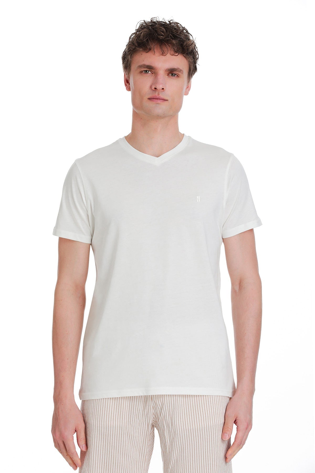 White v-neck cotton t-shirt with a small embroidered logo on the left chest.