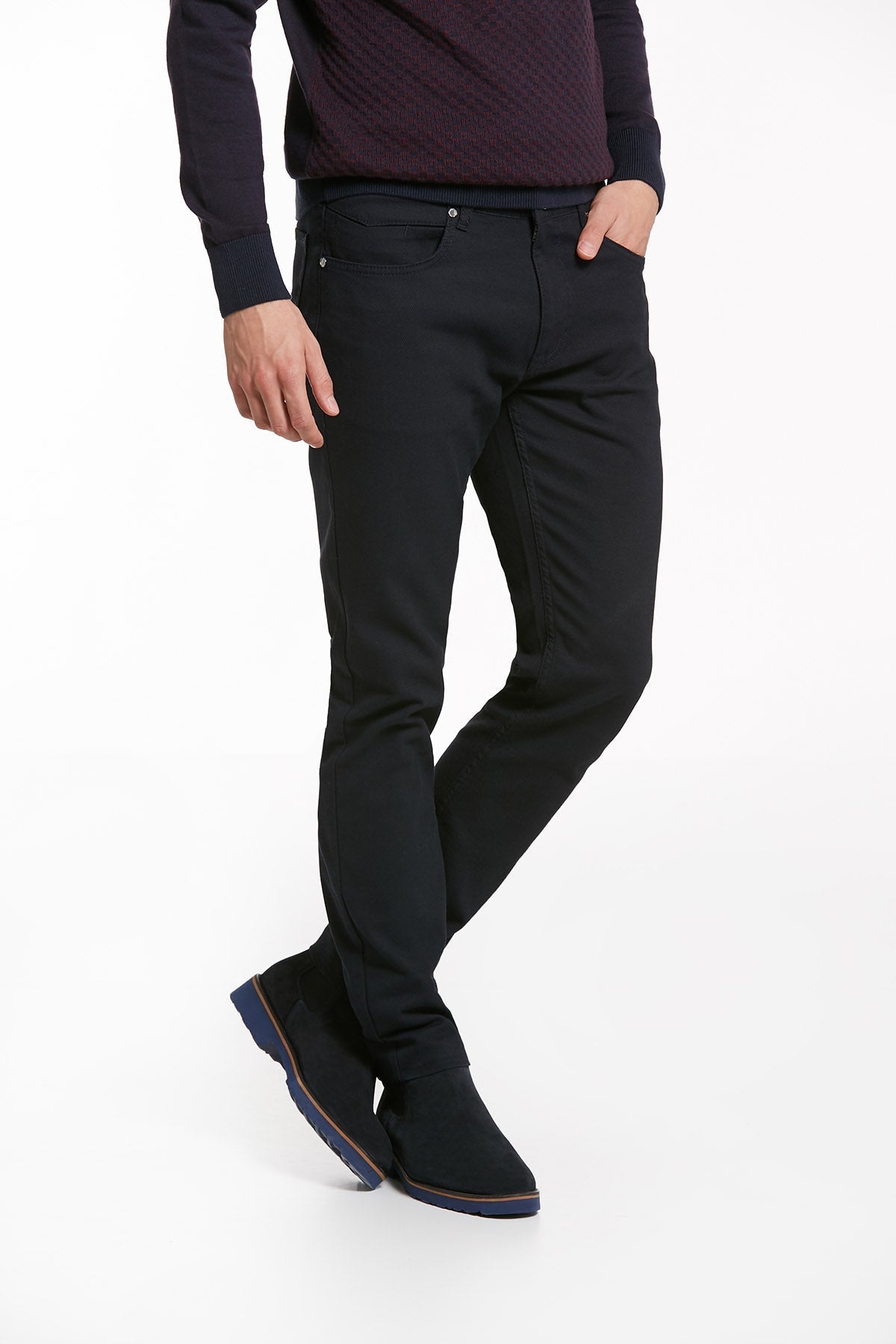 Black slim-fit trousers with a smooth, tailored fabric and subtle stitching details.