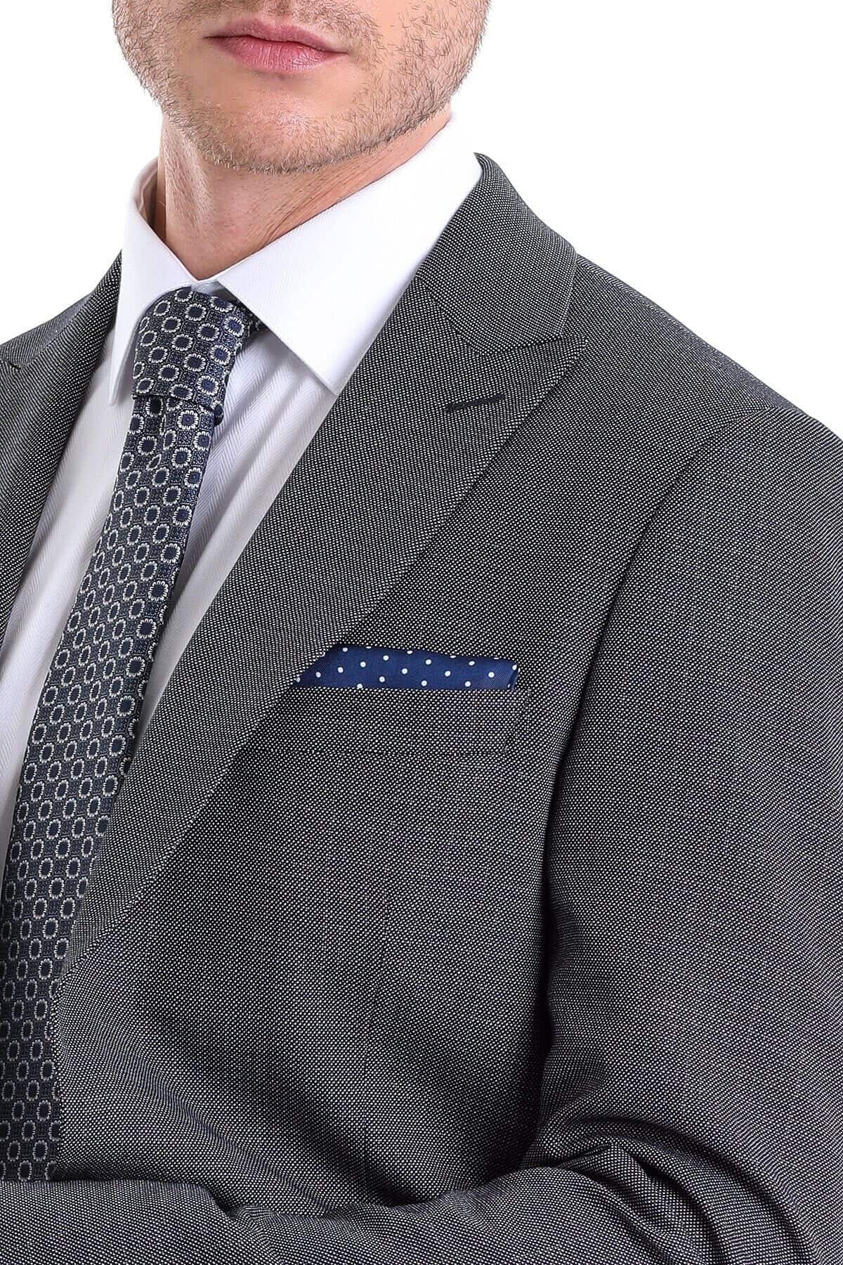 Dark gray textured wool suit jacket with a matching patterned tie and navy blue polka-dot pocket square.