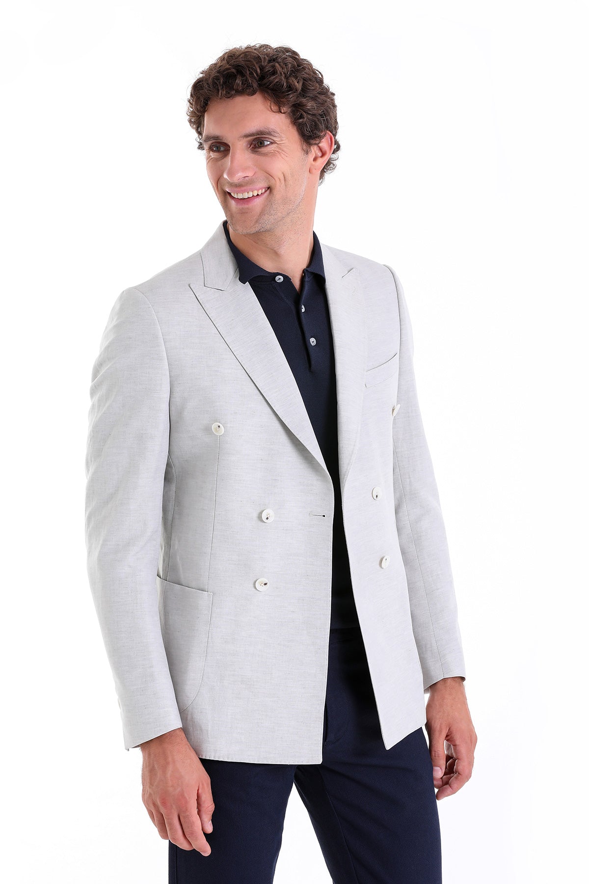 Light gray double-breasted blazer with white buttons and a tailored fit.
