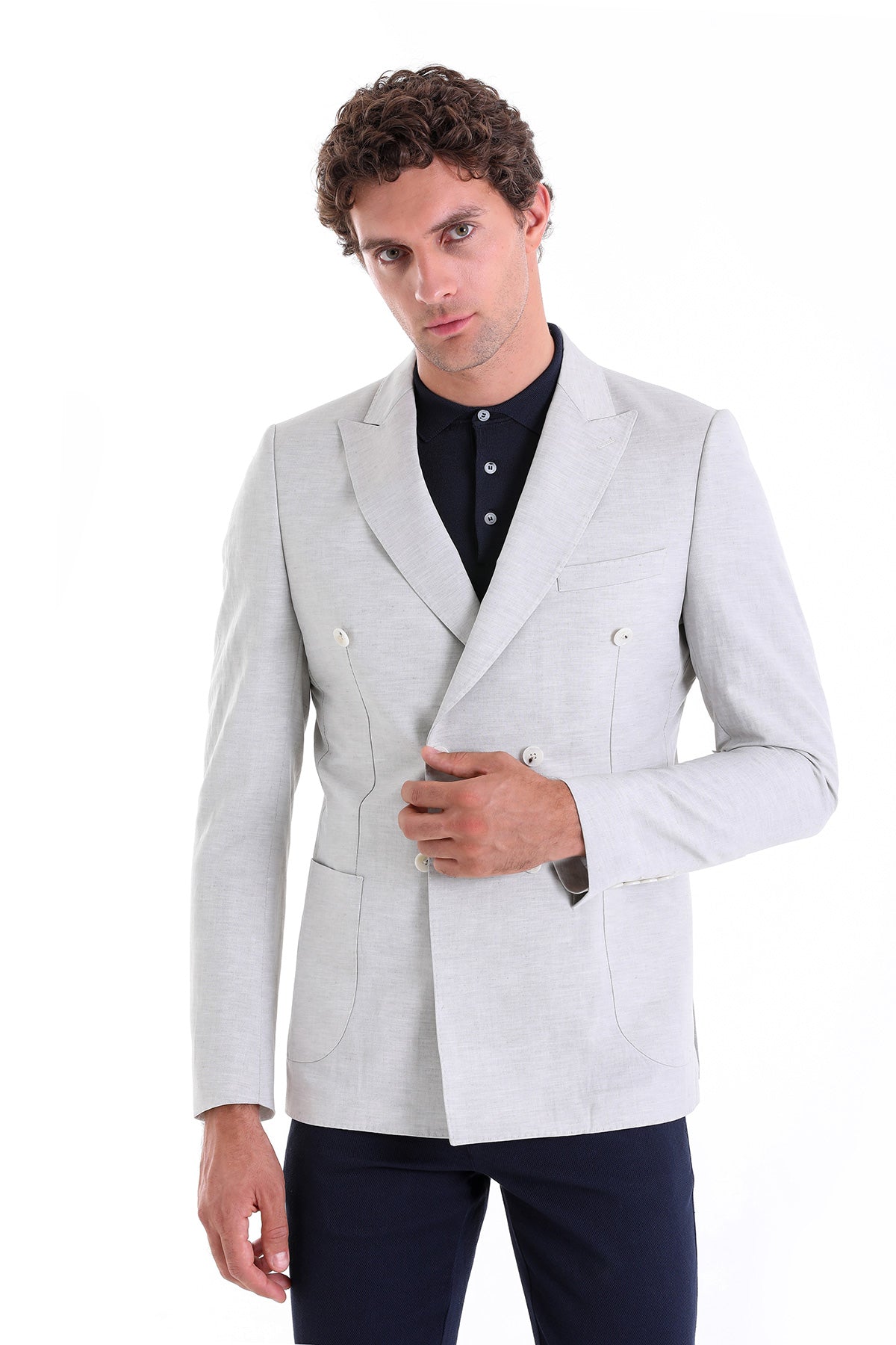 A sleek, light gray double-breasted blazer with a tailored fit and silver-toned buttons.