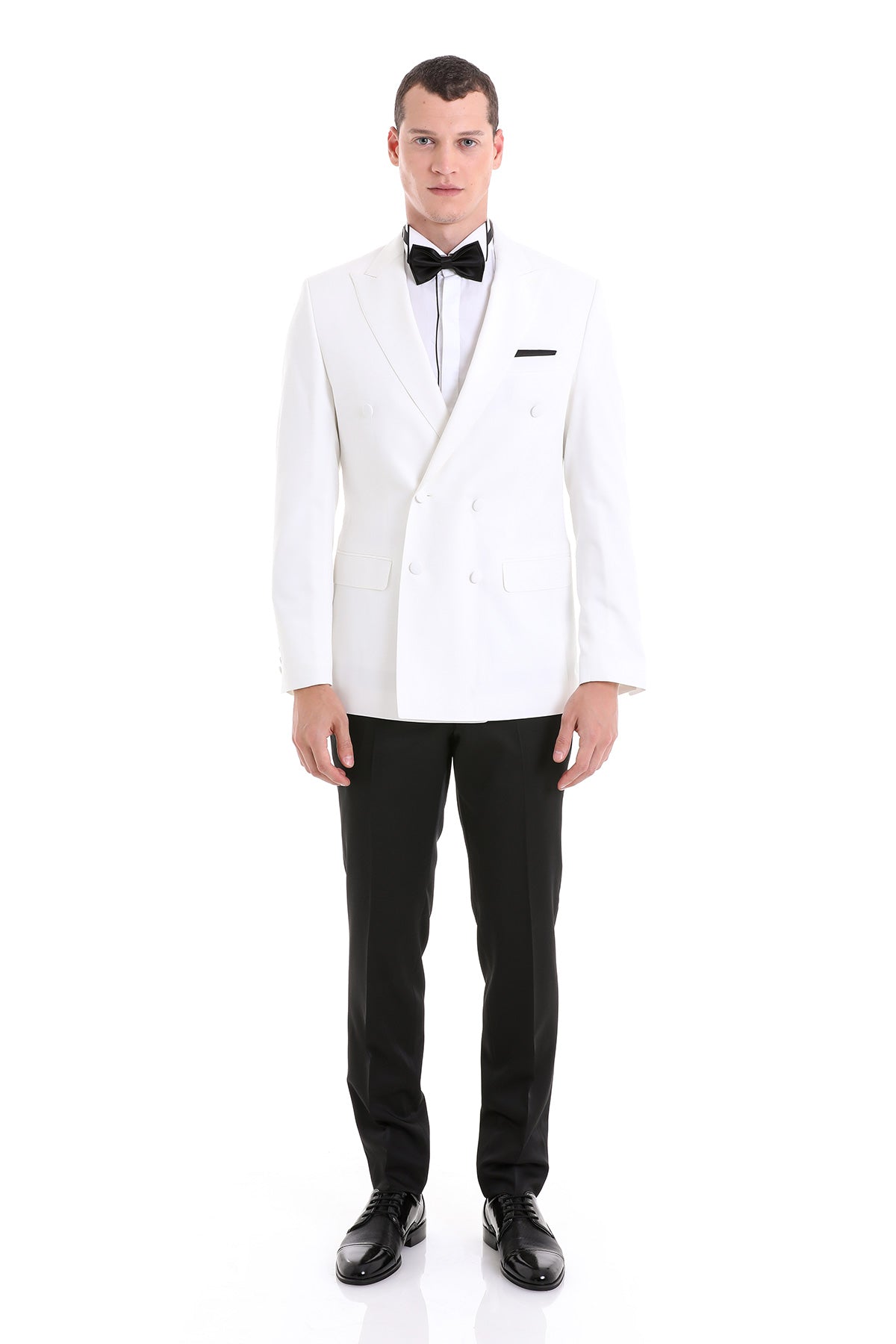 White double-breasted tuxedo jacket with black satin lapels and a matching bow tie.