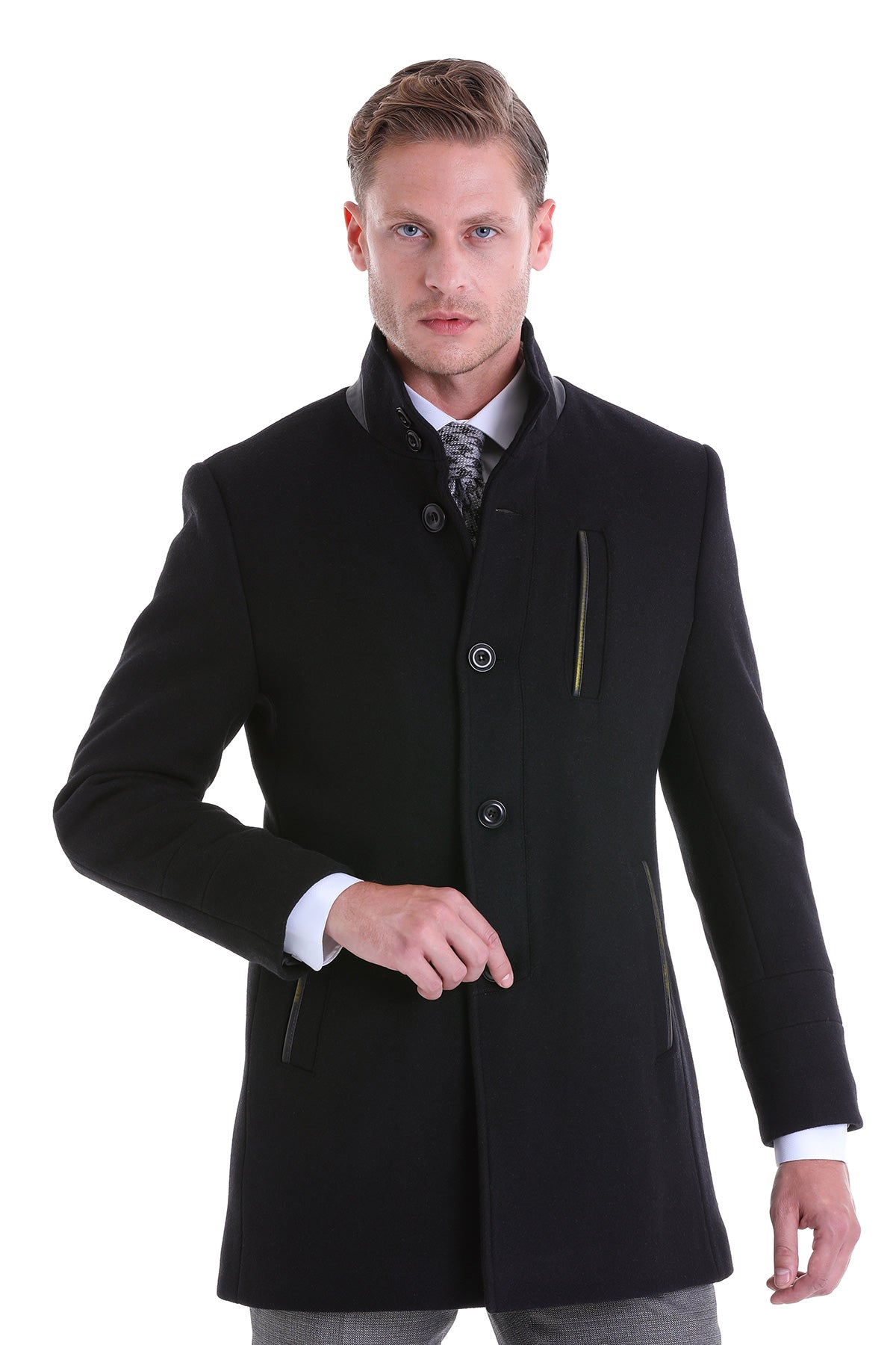 Black woolen men’s overcoat with a notched collar and subtle gold zipper accents.