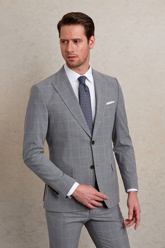 A tailored gray checkered suit with a matching vest and trousers, featuring subtle contrast stitching and dark brown buttons.