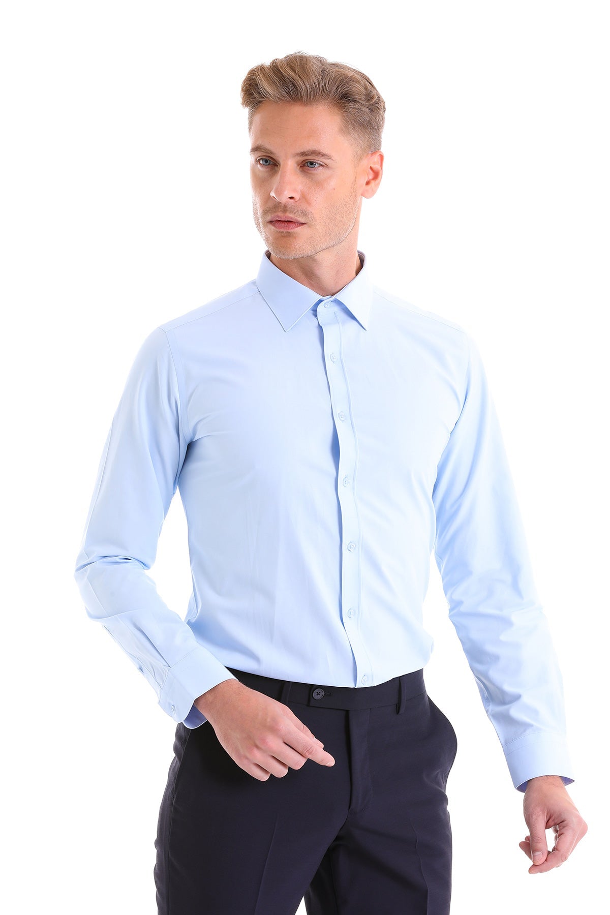 A light blue, long-sleeved men’s dress shirt with a classic collar and button-down front.