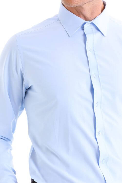 Light blue, long-sleeved men’s dress shirt with a classic collar and button-down front.