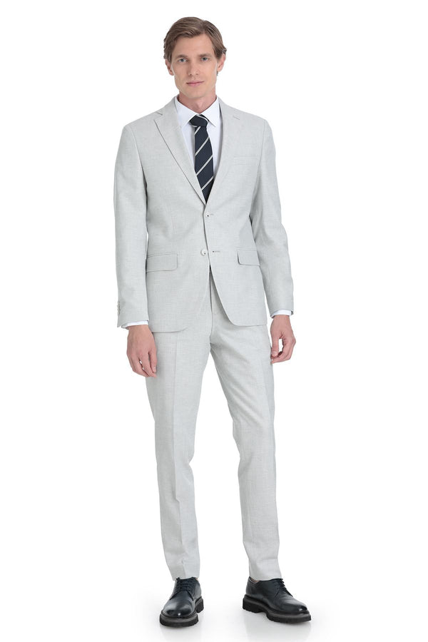 A sleek, light gray two-piece suit with a tailored fit and subtle texture.