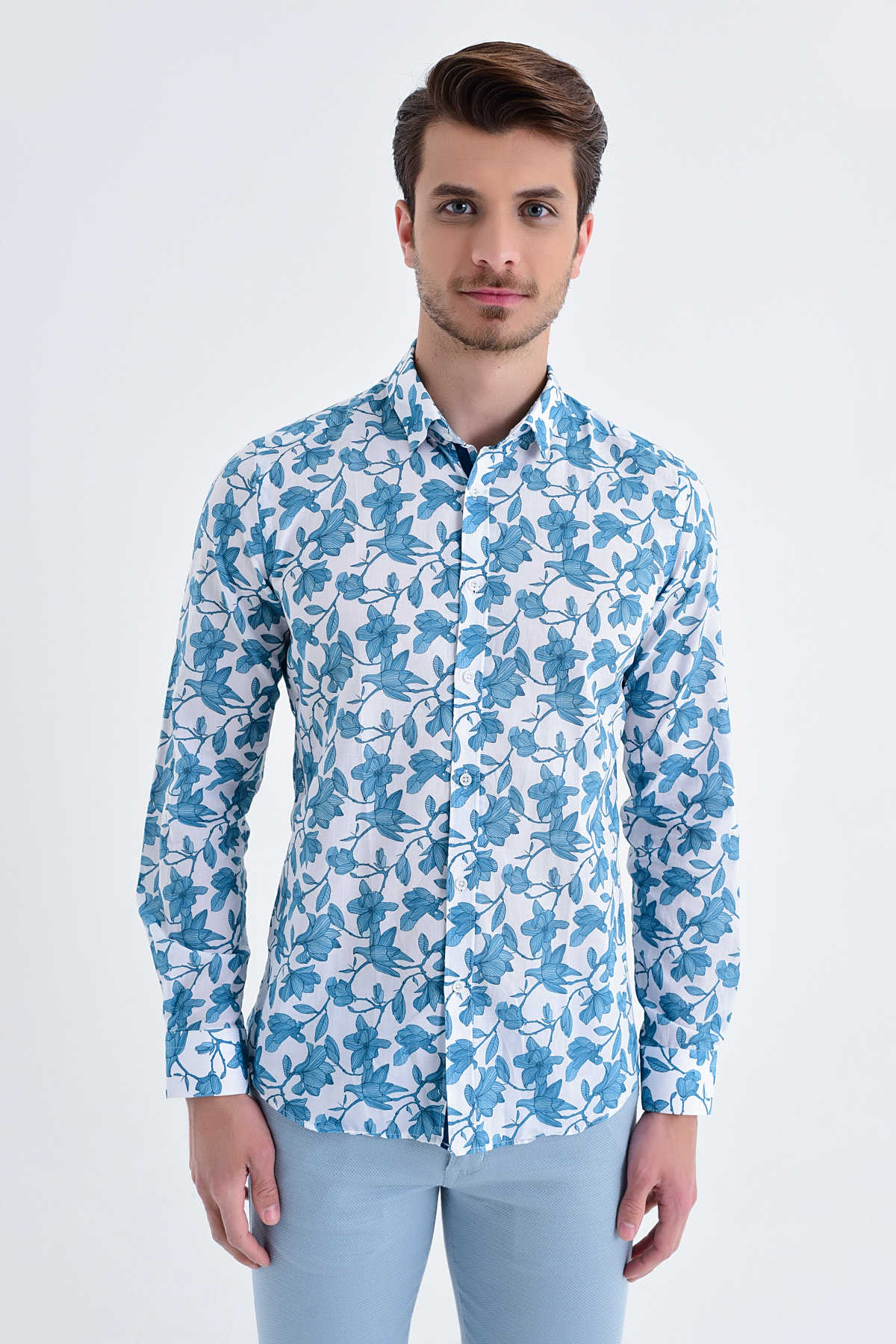 Blue floral patterned long-sleeve button-down shirt.