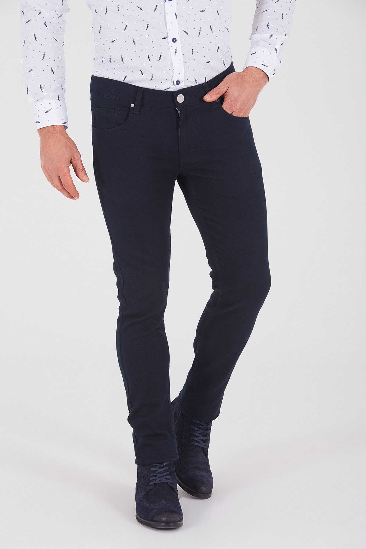Dark navy blue slim-fit jeans with a classic five-pocket design and button closure.