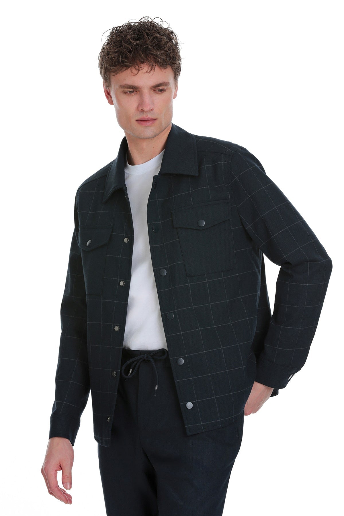 Dark green plaid jacket with subtle grid pattern and silver-toned buttons.