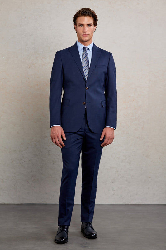 Navy blue tailored suit with a subtle sheen and classic two-button front