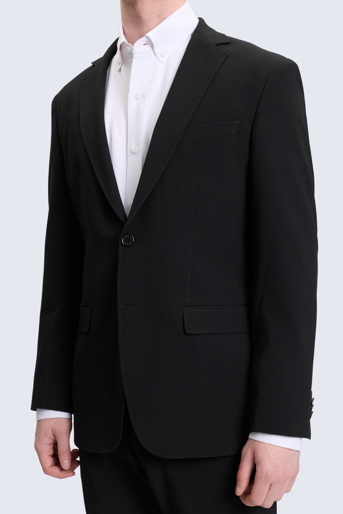 Slim fit black tailored blazer with notch lapels and single button closure for a smart casual look