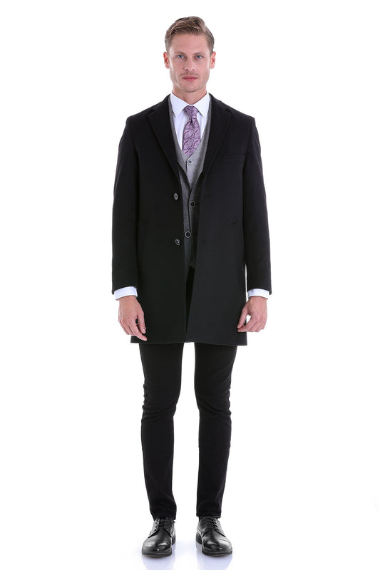 Black wool overcoat with notched lapels and double-breasted button closure.