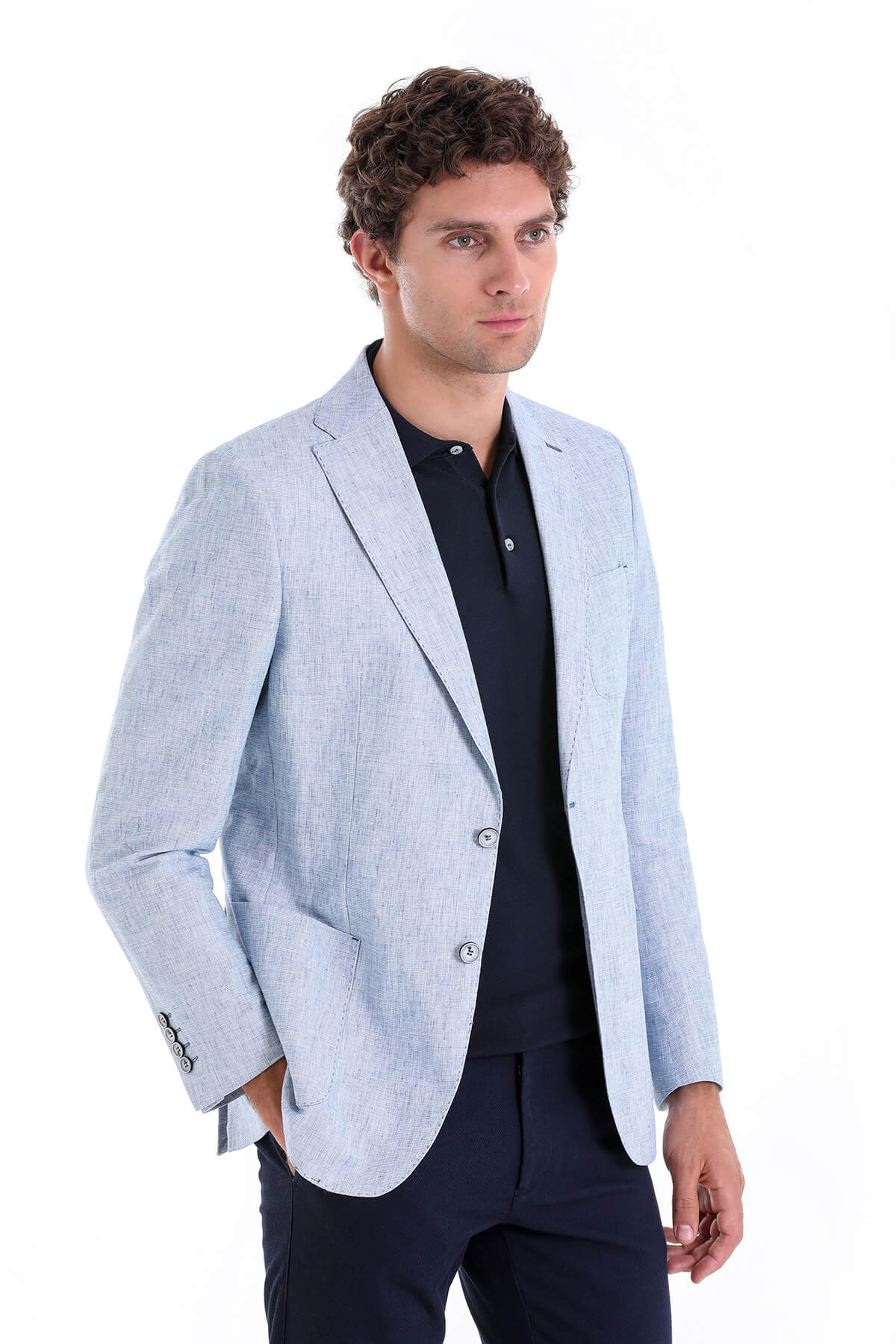 Light blue textured blazer with subtle pattern and silver buttons.