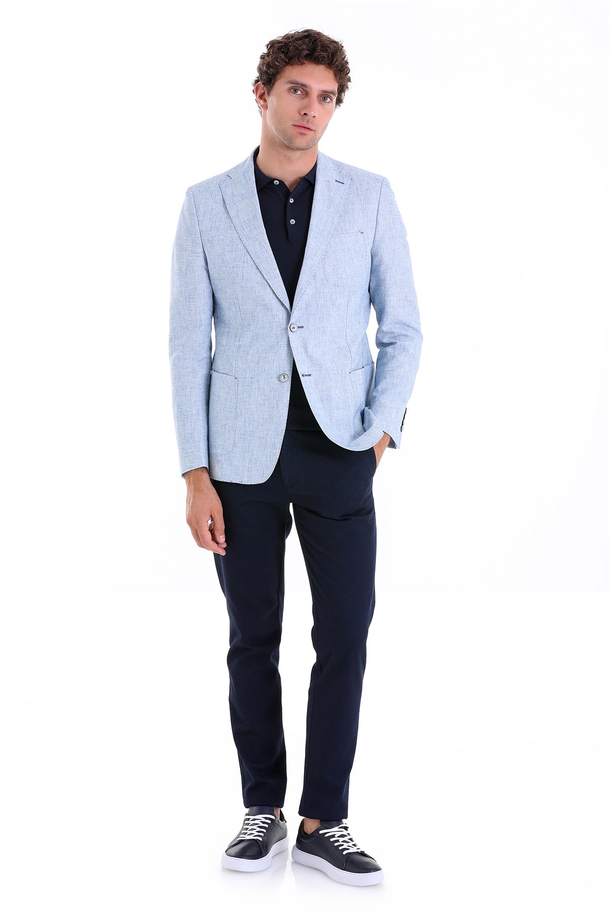 Light blue textured blazer with subtle pattern and two-button closure.