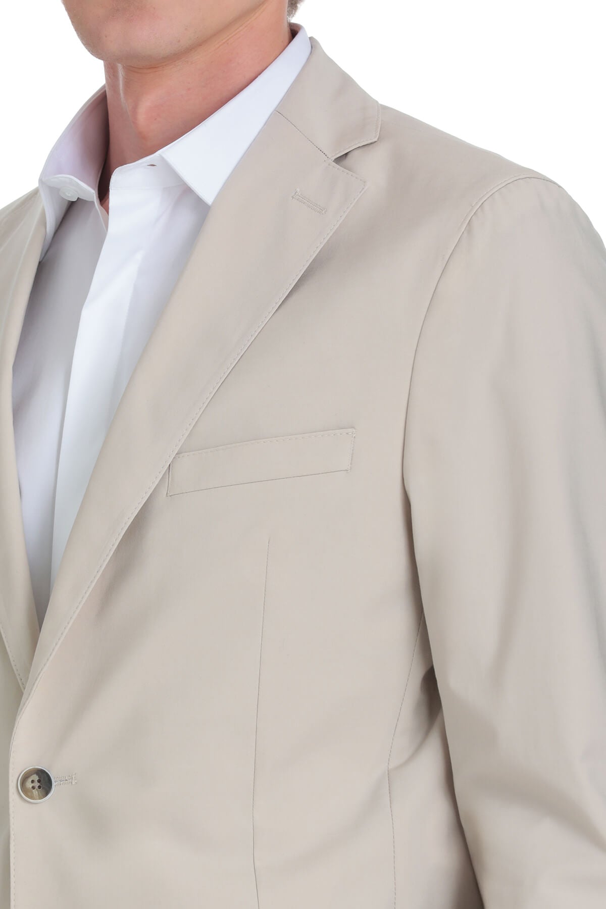 Beige blazer with a sleek, tailored fit and subtle texture.