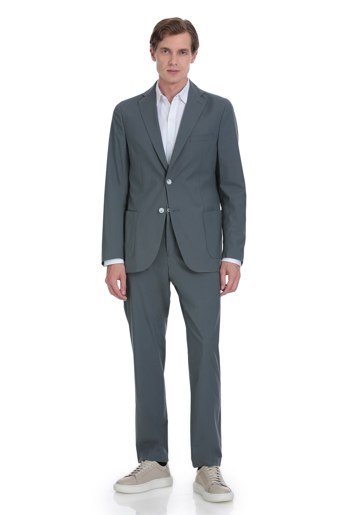 A sleek, charcoal-gray tailored suit with a modern cut and subtle texture.