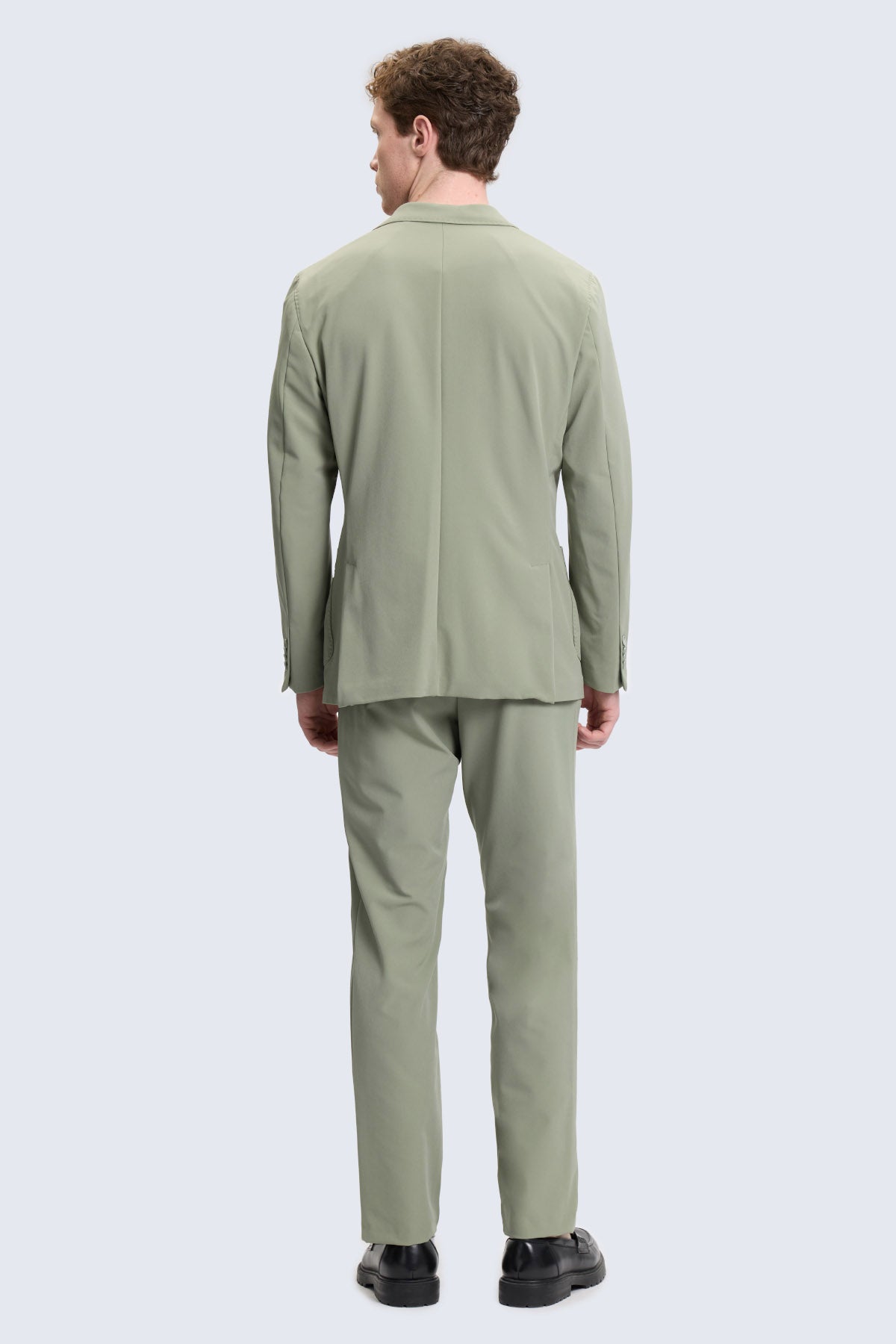 Slim fit notch lapel sage green casual suit with a modern cut and subtle texture in olive green tailored fabric