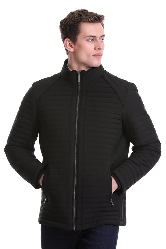 Black quilted men’s jacket with a high collar and front zipper.