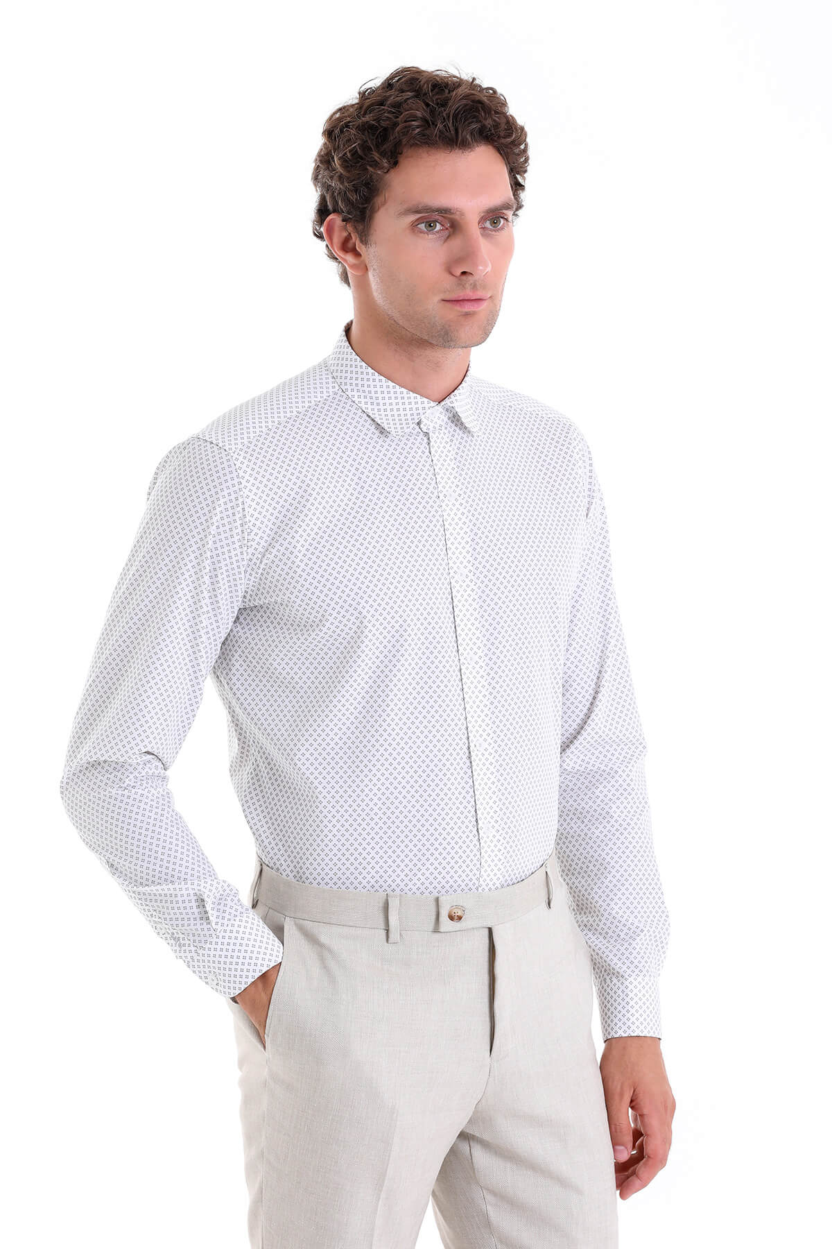A crisp white long-sleeved dress shirt with a subtle blue dot pattern and classic collar.