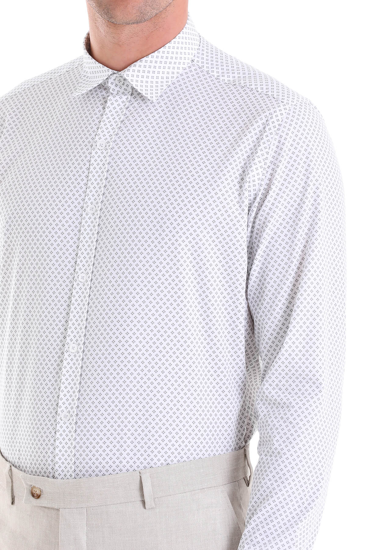 A crisp white dress shirt with a subtle geometric pattern in light gray, featuring a classic collar and button-down front.