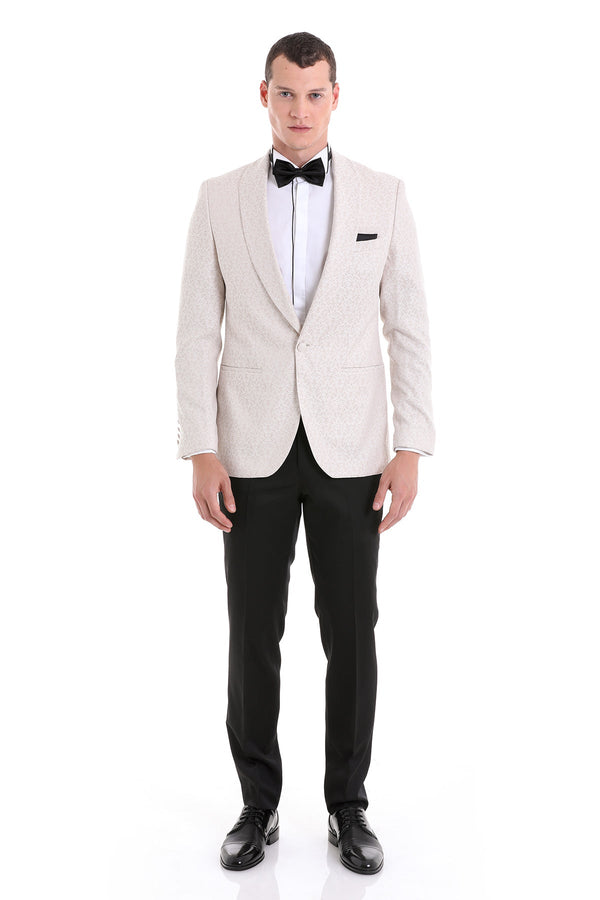 Slim fit cream tuxedo jacket with floral jacquard texture and shawl lapel paired with black trousers