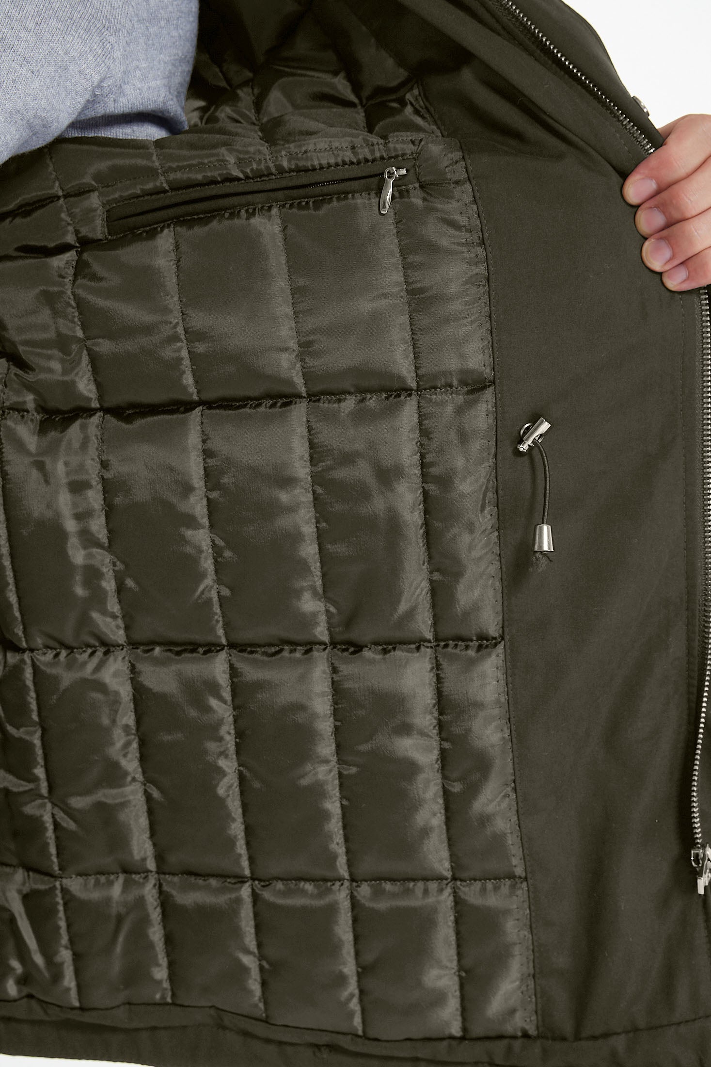 Dark olive quilted puffer jacket with shiny nylon fabric and silver zippers.