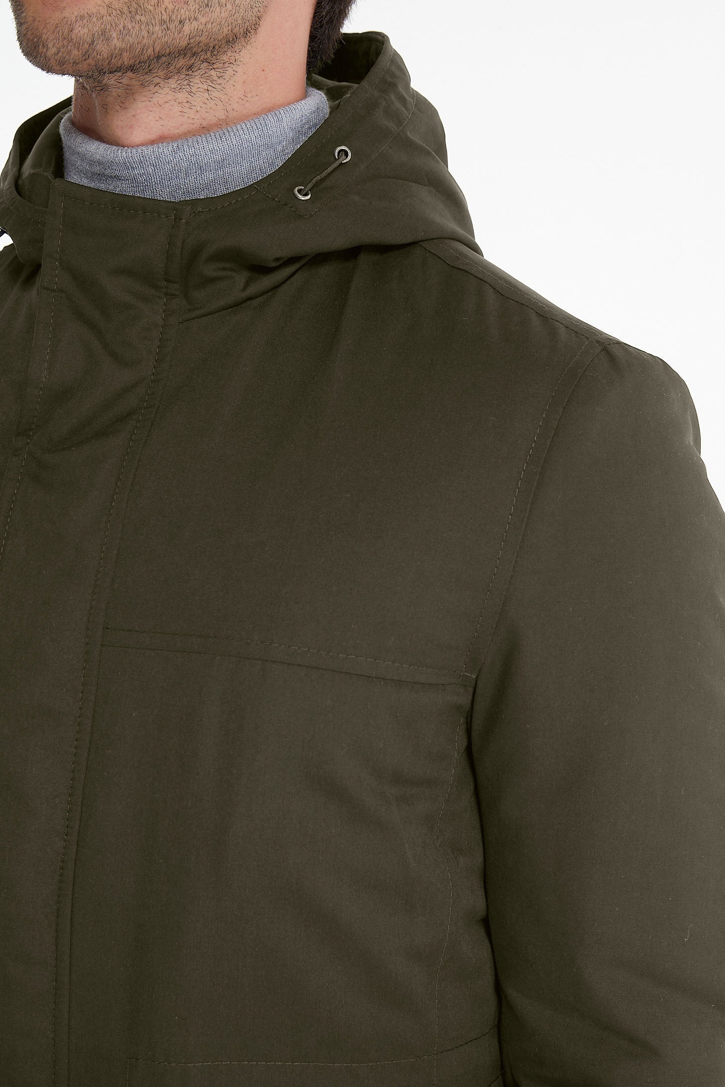 Olive green hooded jacket with a subtle sheen and structured seams