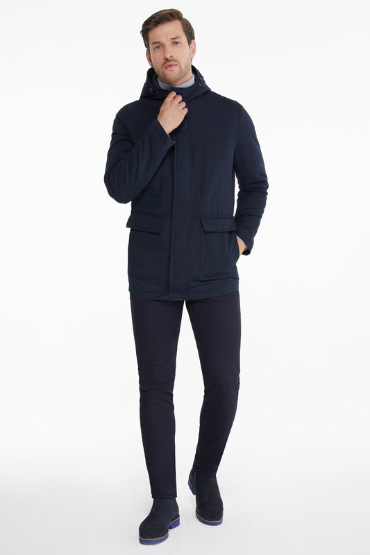Navy blue hooded jacket with a quilted design and front pockets