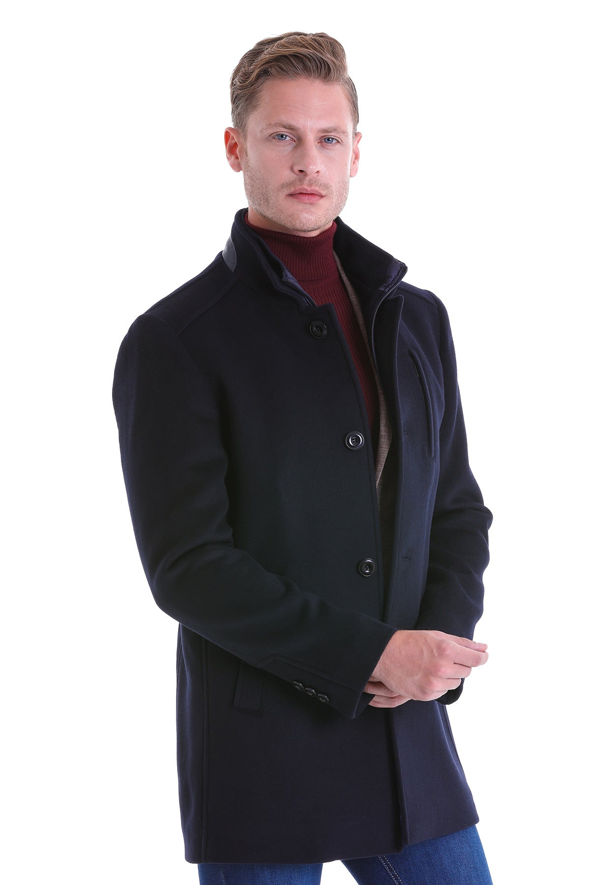Dark navy wool overcoat with a notched collar and black buttons.