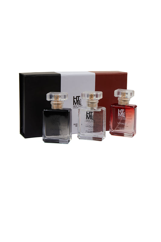 Three rectangular perfume bottles with clear glass, featuring black, transparent, and red liquid inside, each topped with a gold-toned cap.