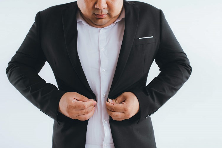 Overweight man wearing suit