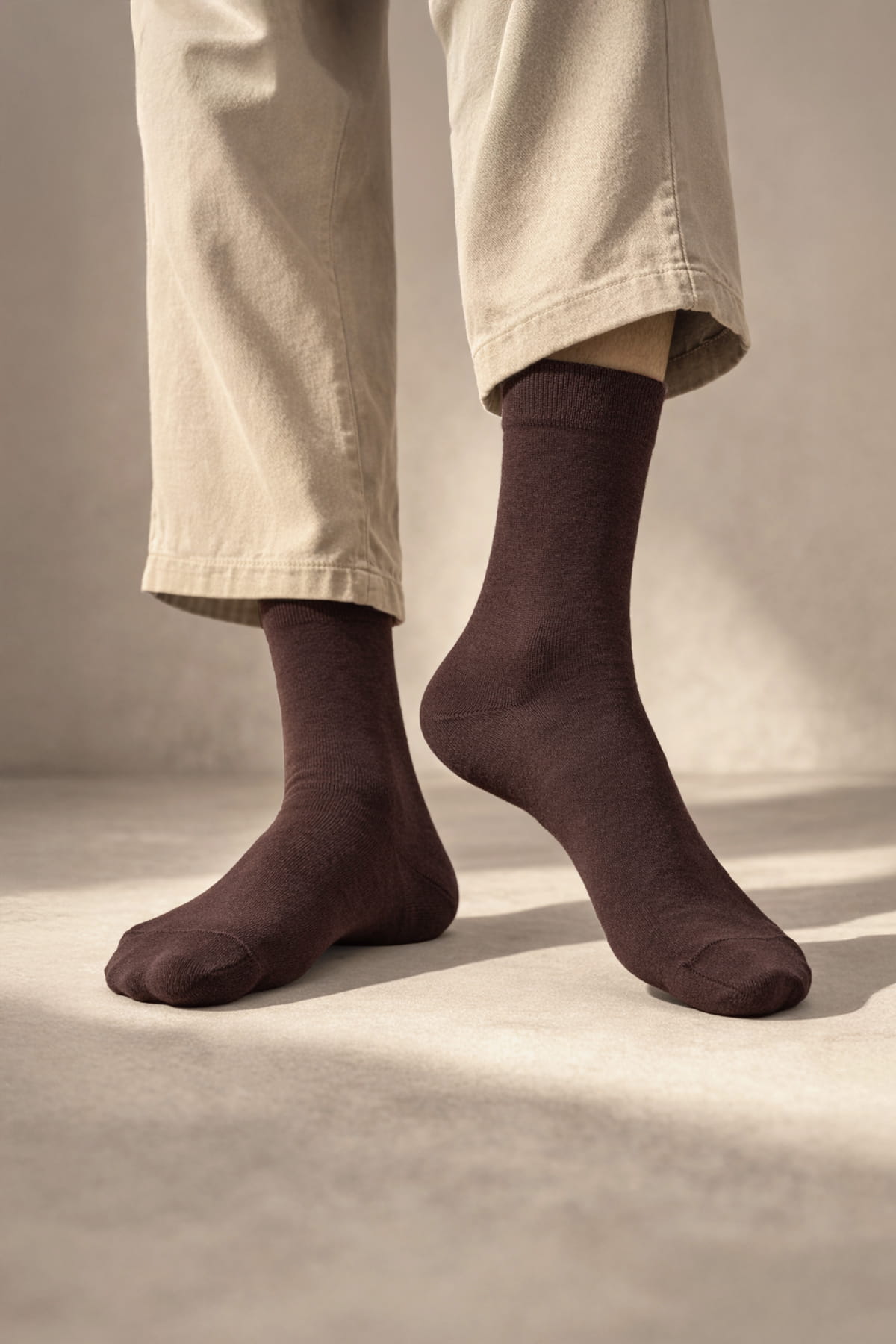 Dark brown plain-knit crew socks from a 4-pack socket bamboo dress socks set made of soft bamboo material
