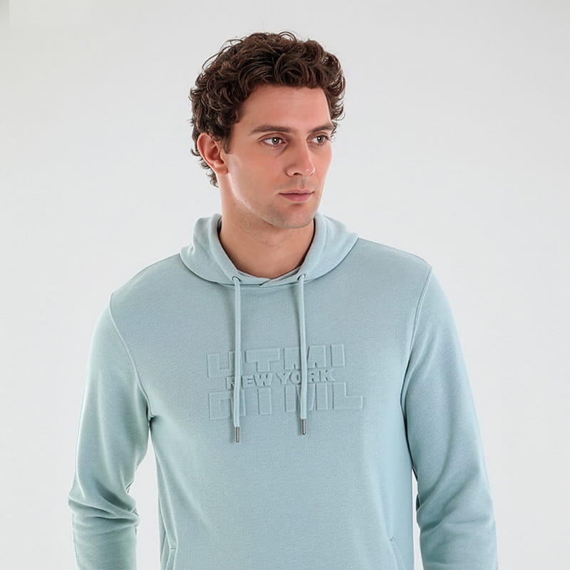 Man wearing mint green hoodie, casual knitwear gift category