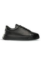 Black pebbled leather low-top sneaker with a chunky rubber sole.