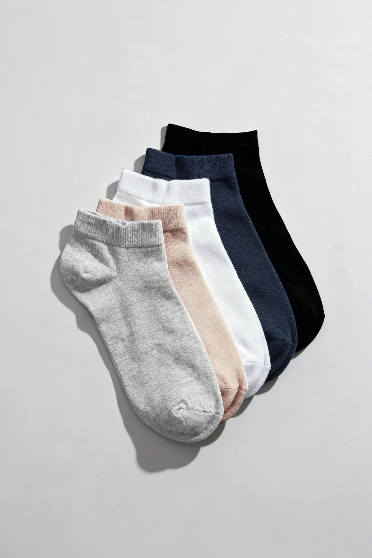 A bamboo 5-pack breathable socks gift box featuring five ankle socks in soft neutral tones including gray pink white navy and black