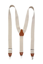 Beige fabric suspenders with brown leather trim and silver leather trim clip clasps for stylish support