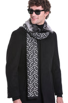 Black and gray patterned scarf with a plush, faux-fur collar.