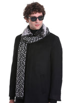 Black and gray patterned scarf with a plush, faux-fur collar.