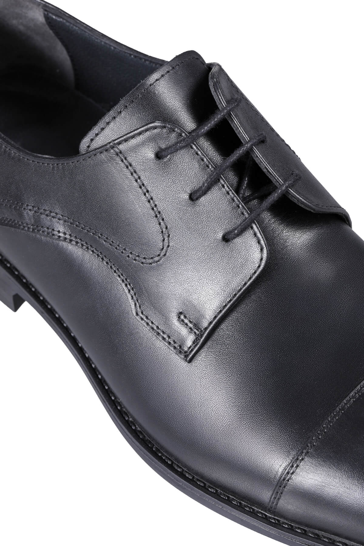 Black leather dress shoe with a polished finish and classic lace-up design.