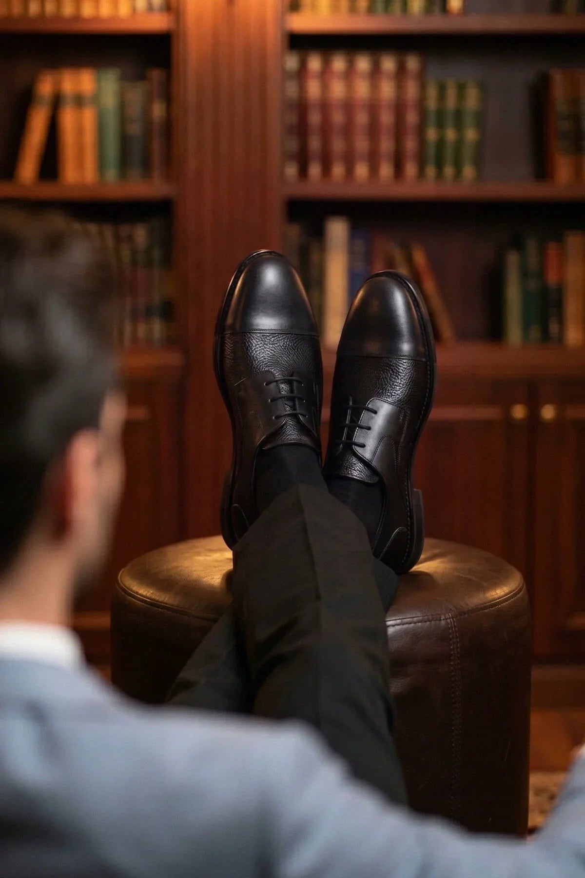 Black lace up 100 percent leather classic derby shoes with polished finish and subtle texture in black leather classic derby style