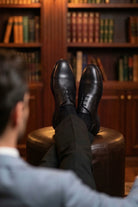 Black lace up 100 percent leather classic derby shoes with polished finish and subtle texture in black leather classic derby style