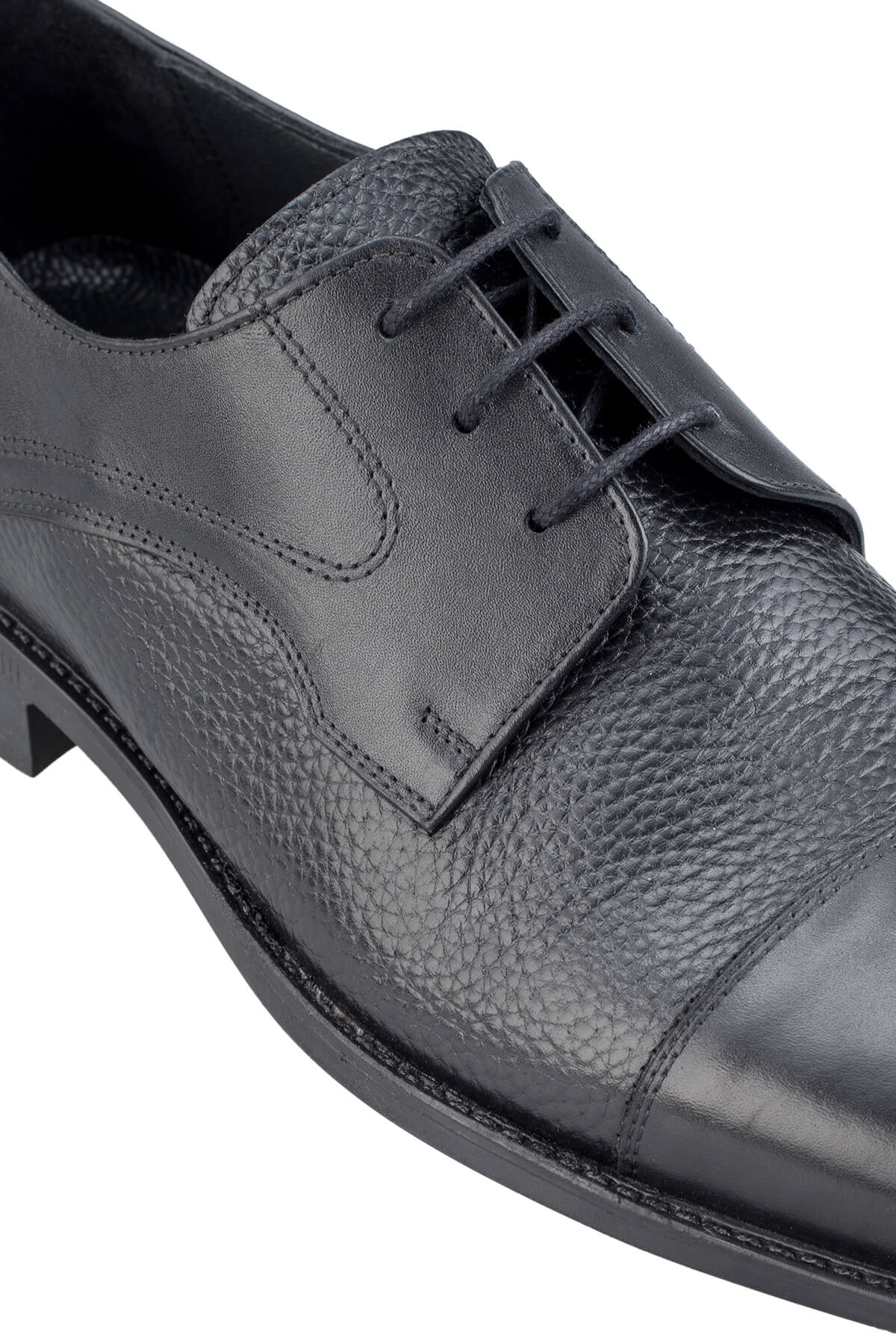 Black leather derby shoe with a pebbled texture and polished toe cap.