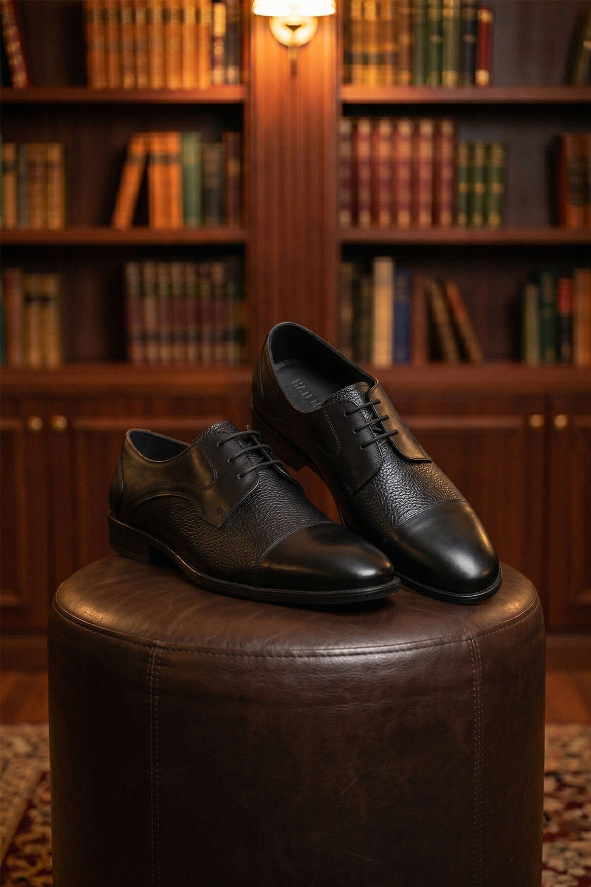 Black lace up 100 percent leather classic derby shoes with textured toe cap and smooth upper in black leather