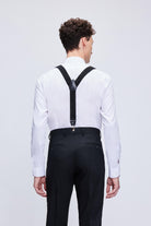Black leather trim clip suspenders with adjustable straps and matte metal clasps for a sleek secure fit